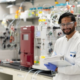 scientist smiling in lab